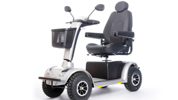 generic electric mobility scooter for disabled or elderly people against white background in studio